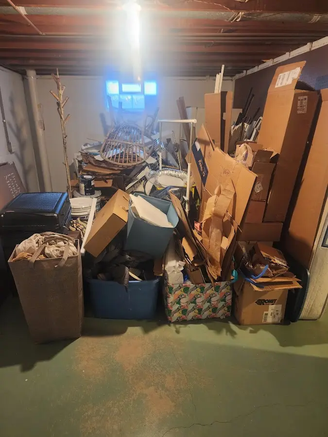 Roll-off dumpster container at job site for 8 Yard Dumpster Rental in Anthony